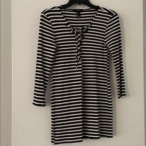 Striped top with criss cross detailing